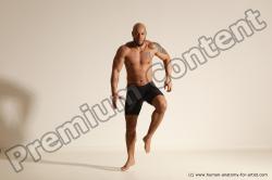 Underwear Gymnastic poses Man Black Muscular Bald Dancing Dynamic poses Academic